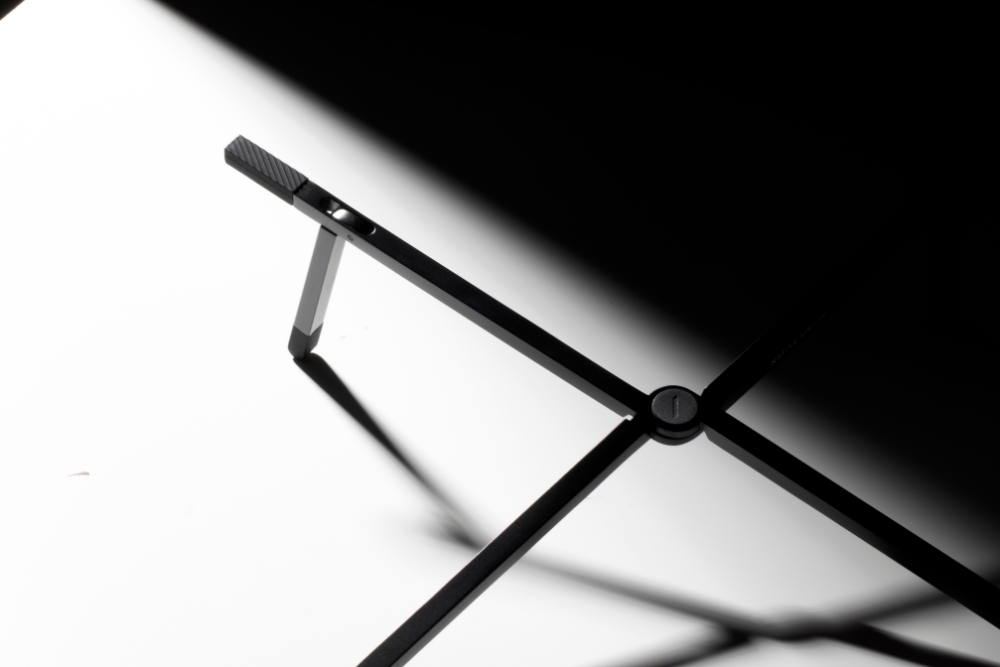 The Ultimate Guide to Laptop Stands: Ergonomics, Types, and Top Picks